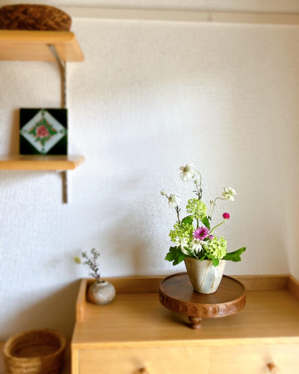 Small focused flower styling in a Japanese pitcher, adding a quiet sense of focus to the home decor